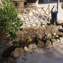 Small rock garden with trellis